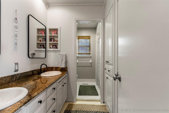 2962 E 56th Ct, Tulsa, OK 74105 - bathroom with double vanity, a closet, and tile patterned flooring