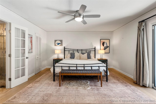 2962 E 56th Ct, Tulsa, OK 74105 - bedroom with wood finished floors and ceiling fan