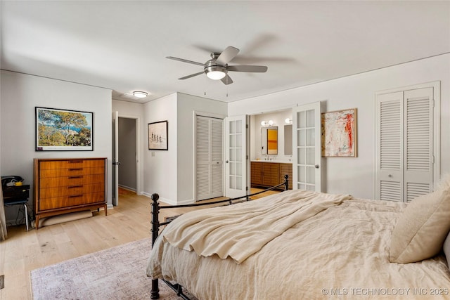 2962 E 56th Ct, Tulsa, OK 74105 - bedroom featuring wood finished floors, connected bathroom, a ceiling fan, and french doors