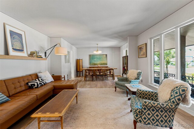 2962 E 56th Ct, Tulsa, OK 74105 - living room featuring wood finished floors