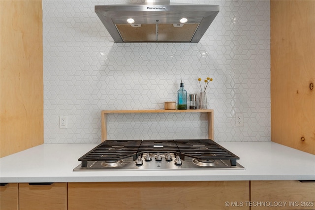 2962 E 56th Ct, Tulsa, OK 74105 - kitchen with extractor fan, stainless steel gas stovetop, tasteful backsplash, and light countertops