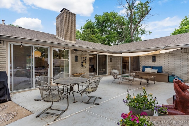 2962 E 56th Ct, Tulsa, OK 74105 - view of patio featuring an outdoor living space and outdoor dining space
