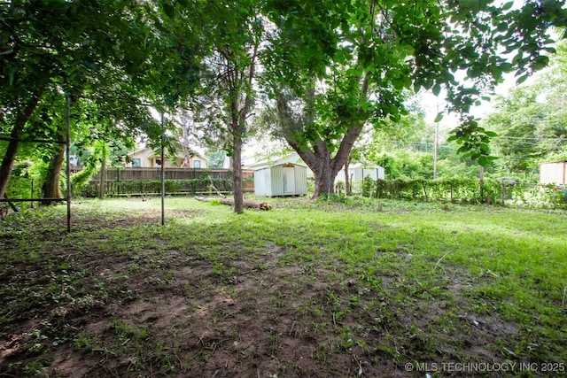 812 N Delaware Pl, Tulsa, OK 74110 - view of yard with a storage shed