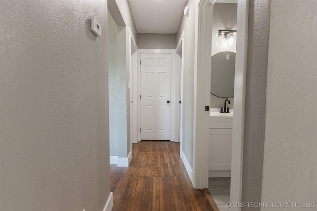 812 N Delaware Pl, Tulsa, OK 74110 - hall featuring hardwood / wood-style floors and a textured wall