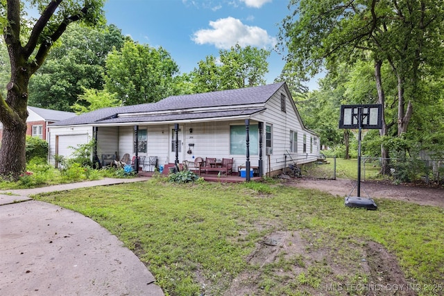 2820 W Okmulgee, Muskogee, OK 74401 - view of front of home featuring a shingled roof and an attached garage