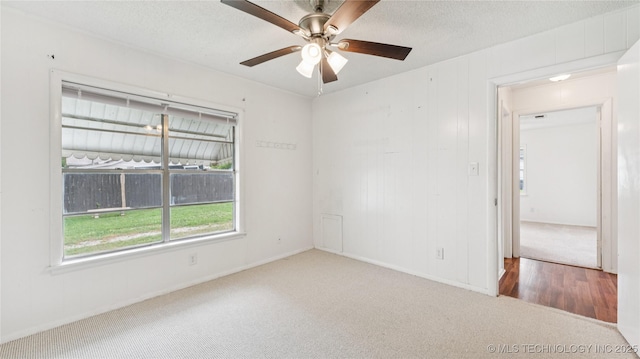 702 E Elgin Pl, Broken Arrow, OK 74012 - carpeted empty room featuring ceiling fan and baseboards
