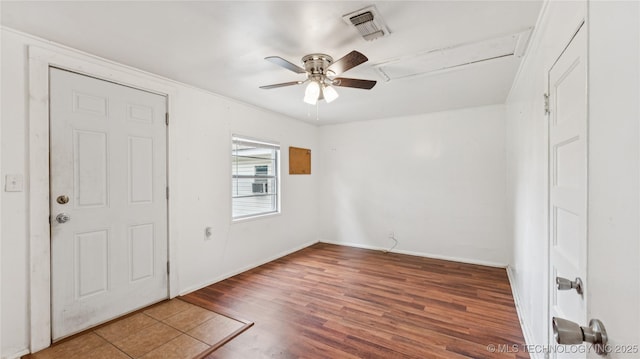 702 E Elgin Pl, Broken Arrow, OK 74012 - spare room with ceiling fan and wood finished floors