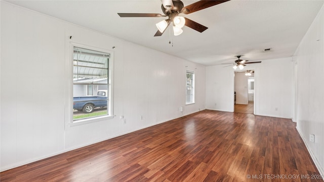 702 E Elgin Pl, Broken Arrow, OK 74012 - empty room featuring a ceiling fan and wood finished floors