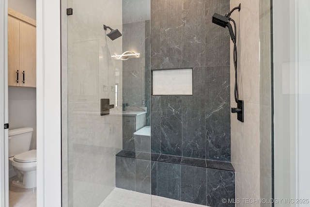 12622 S Granite Ave E, Bixby, OK 74008 - bathroom featuring a stall shower and toilet