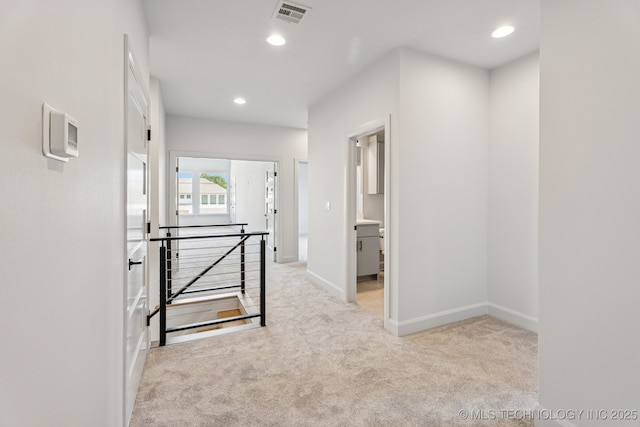 12622 S Granite Ave E, Bixby, OK 74008 - corridor featuring carpet, an upstairs landing, and recessed lighting