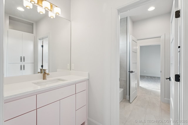 12622 S Granite Ave E, Bixby, OK 74008 - bathroom with vanity, shower / washtub combination, and a chandelier