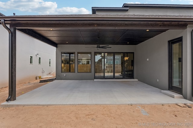 12622 S Granite Ave E, Bixby, OK 74008 - rear view of property with ceiling fan, a patio, and stucco siding
