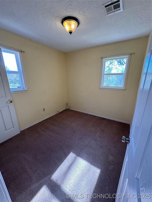 14274 W Clyde Maher, Tahlequah, OK 74464 - unfurnished room featuring carpet flooring and a textured ceiling