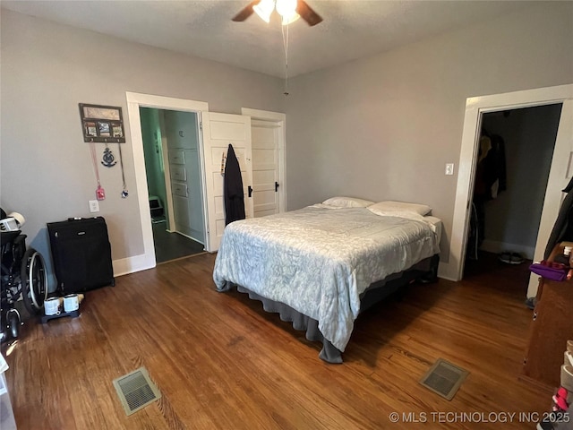 307 NE A St, Antlers, OK 74523 - bedroom featuring dark wood-style flooring and baseboards