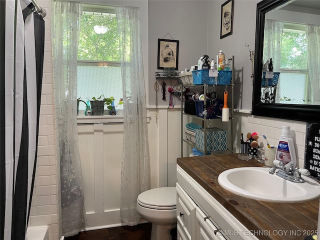 307 NE A St, Antlers, OK 74523 - full bath featuring vanity and wainscoting
