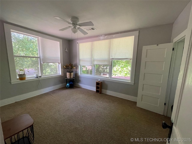 307 NE A St, Antlers, OK 74523 - carpeted spare room featuring a ceiling fan and baseboards