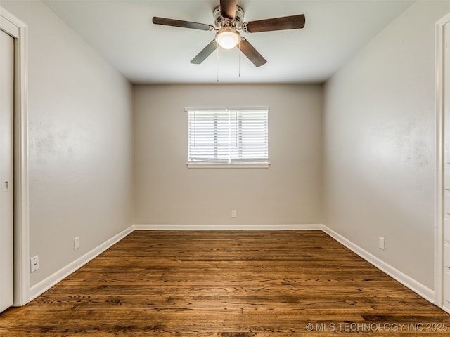 4512 SE Frank Phillips Blvd, Bartlesville, OK 74006 - spare room featuring ceiling fan and dark wood-style floors