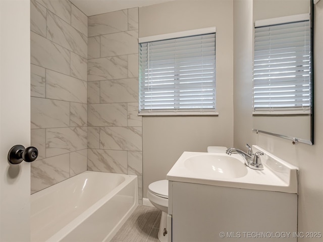 4512 SE Frank Phillips Blvd, Bartlesville, OK 74006 - bathroom featuring vanity and bathtub / shower combination