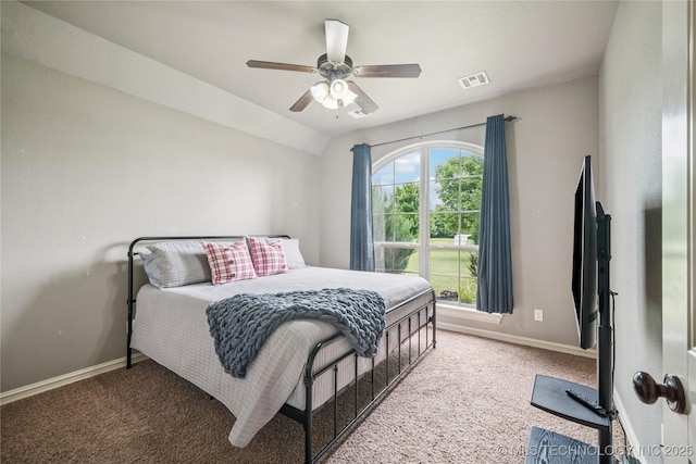 18820 S Kiowa Rd, Claremore, OK 74017 - carpeted bedroom with vaulted ceiling and a ceiling fan