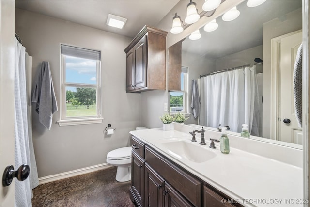 18820 S Kiowa Rd, Claremore, OK 74017 - bathroom featuring vanity, healthy amount of natural light, and a shower with curtain