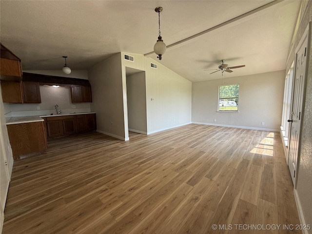 97951 S 4489th Rd, Vian, OK 74962 - unfurnished living room featuring light wood finished floors and a ceiling fan