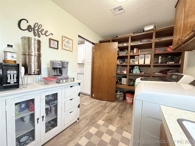 1604 N 2nd Ave, Warner, OK 74469 - storage area with washer and clothes dryer