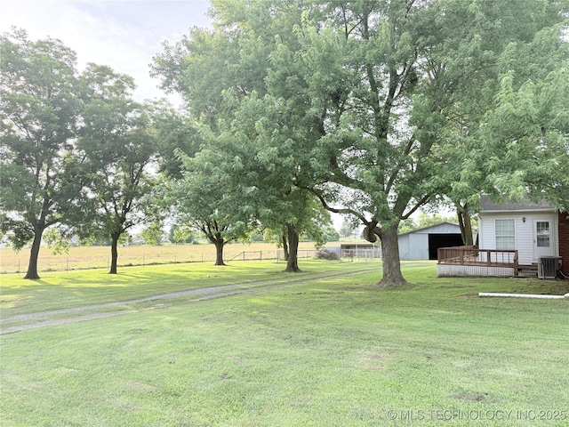 1604 N 2nd Ave, Warner, OK 74469 - view of yard featuring an outdoor structure and a deck