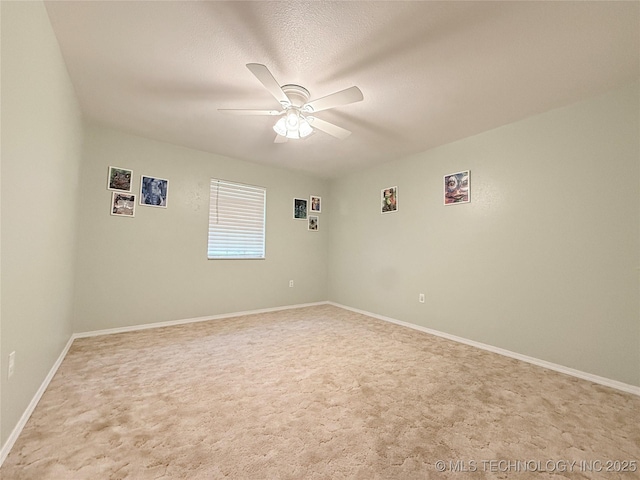 1604 N 2nd Ave, Warner, OK 74469 - carpeted empty room with ceiling fan and baseboards