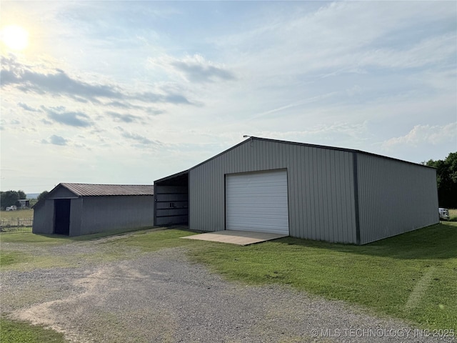 1604 N 2nd Ave, Warner, OK 74469 - detached garage featuring driveway