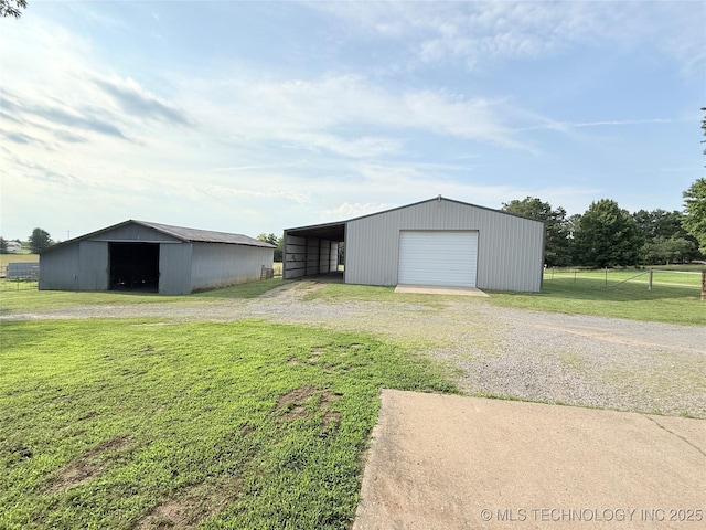 1604 N 2nd Ave, Warner, OK 74469 - view of pole building featuring driveway