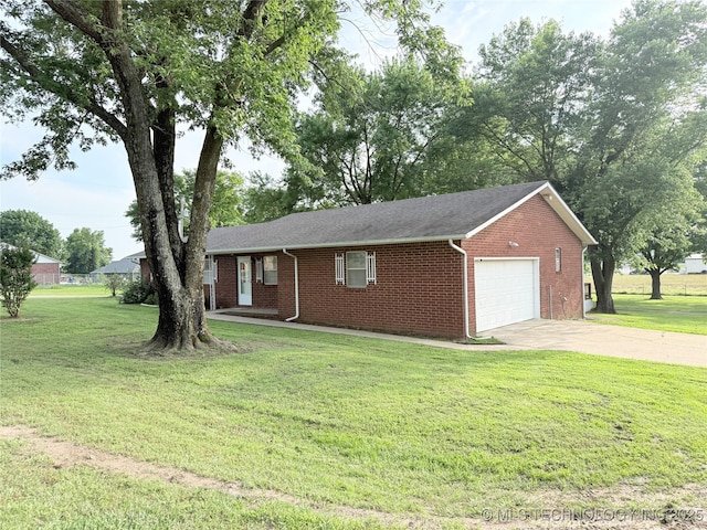 1604 N 2nd Ave, Warner, OK 74469 - ranch-style home with brick siding, an attached garage, a front lawn, and concrete driveway