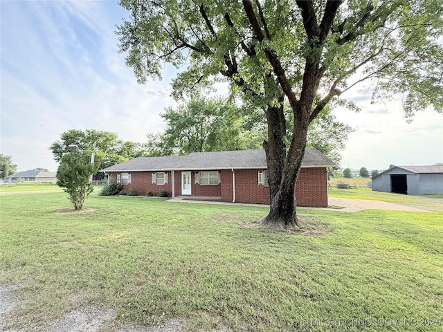 1604 N 2nd Ave, Warner, OK 74469 - single story home featuring a front lawn and brick siding