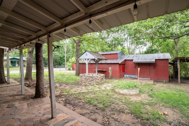 104 Laurel Pl, Bartlesville, OK 74003 - view of yard with an outbuilding