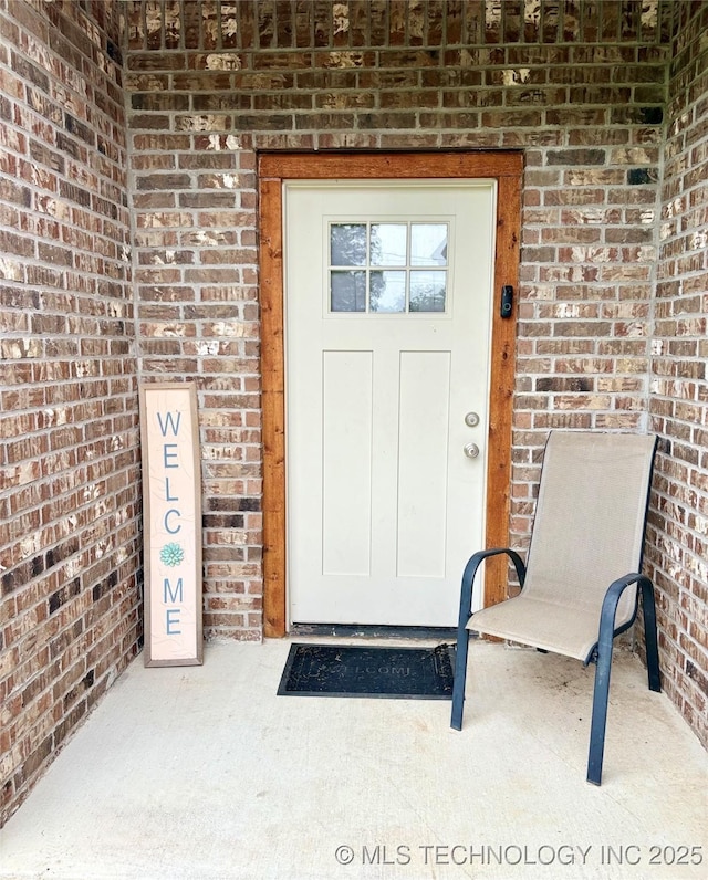 2125 N Lansing Ave W, Tulsa, OK 74106 - view of exterior entry with brick siding