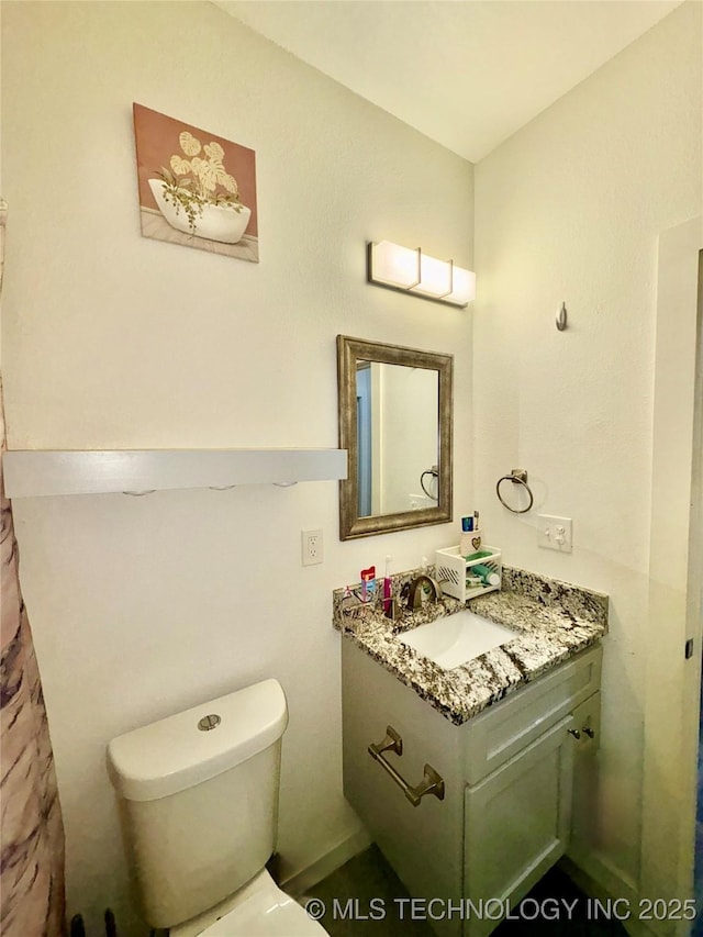 2125 N Lansing Ave W, Tulsa, OK 74106 - bathroom featuring vanity and toilet