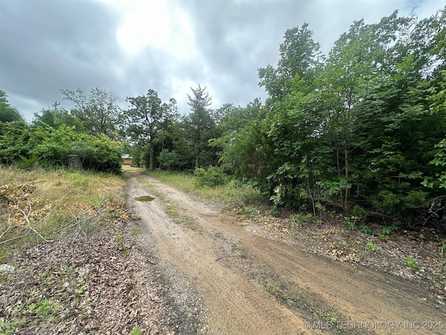 51698 W 139th St S, Drumright, OK 74030 - view of dirt / gravel driveway featuring a forest view
