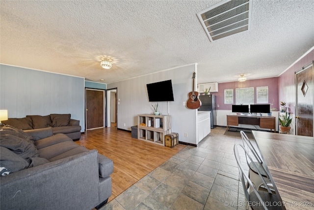 9025 N 156th Rd, Beggs, OK 74421 - living area featuring a textured ceiling and baseboards