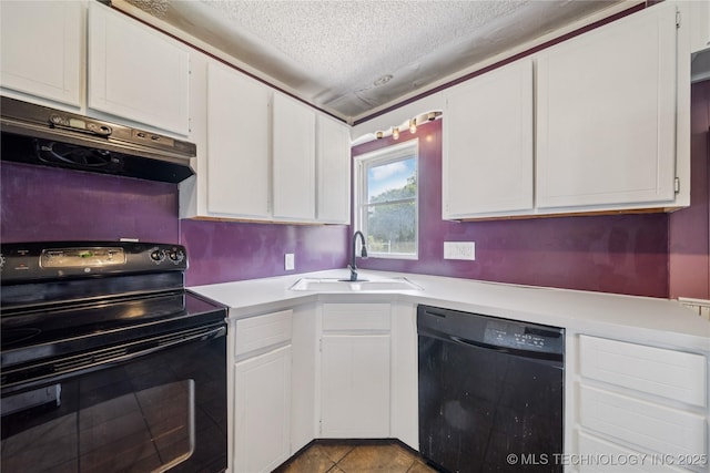9025 N 156th Rd, Beggs, OK 74421 - kitchen featuring black appliances, under cabinet range hood, a textured ceiling, light countertops, and white cabinetry