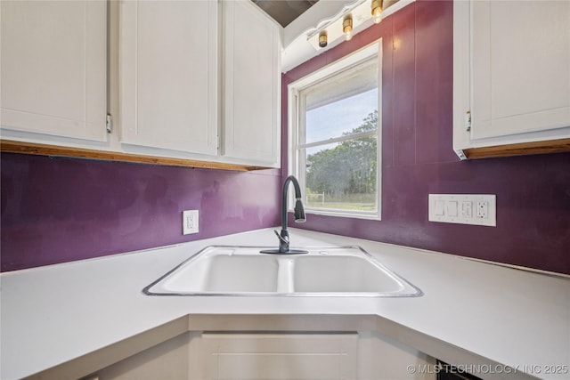 9025 N 156th Rd, Beggs, OK 74421 - kitchen featuring light countertops and white cabinetry