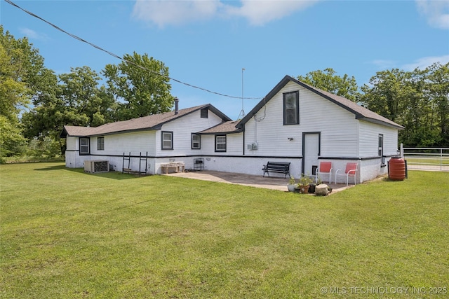 9025 N 156th Rd, Beggs, OK 74421 - back of property featuring a patio and roof with shingles