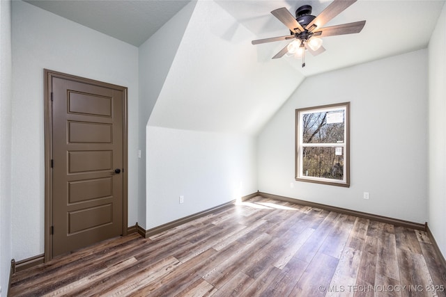 101 Dunn, Caddo, OK 74729 - bonus room with ceiling fan, wood finished floors, and lofted ceiling