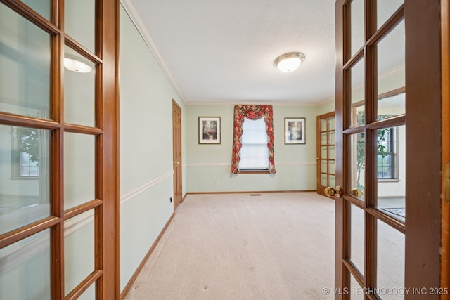 11637 W 86th St S, Sapulpa, OK 74066 - unfurnished room featuring french doors, ornamental molding, light colored carpet, and a textured ceiling
