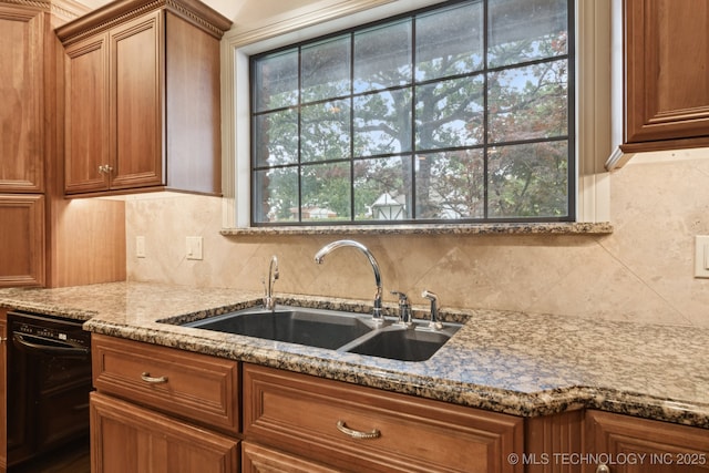 11637 W 86th St S, Sapulpa, OK 74066 - kitchen featuring black dishwasher, brown cabinetry, backsplash, and light stone counters