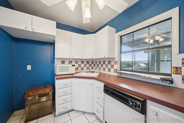 11637 W 86th St S, Sapulpa, OK 74066 - kitchen with white appliances, tasteful backsplash, ceiling fan, and light tile patterned floors