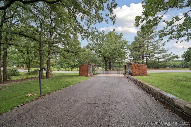 11637 W 86th St S, Sapulpa, OK 74066 - view of asphalt road featuring a gate