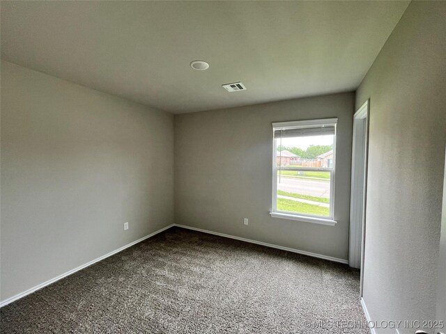 3118 SE Talimena Ct, Bartlesville, OK 74006 - empty room featuring carpet and baseboards