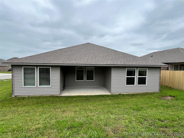 3118 SE Talimena Ct, Bartlesville, OK 74006 - back of house featuring roof with shingles and a patio area
