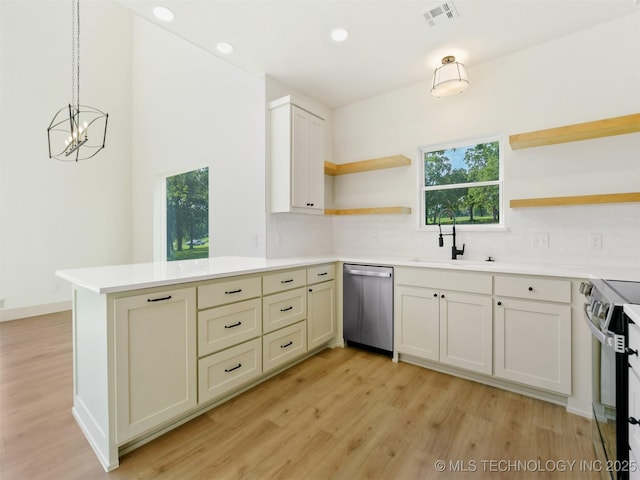 2 Valley View Dr, Burneyville, OK 73430 - kitchen featuring stainless steel appliances, open shelves, a peninsula, light wood-style floors, and recessed lighting