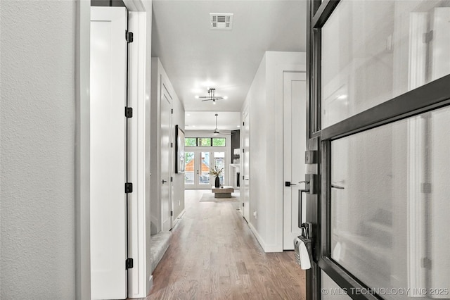 3008 S Boston Ct, Tulsa, OK 74114 - hallway featuring wood finished floors and baseboards