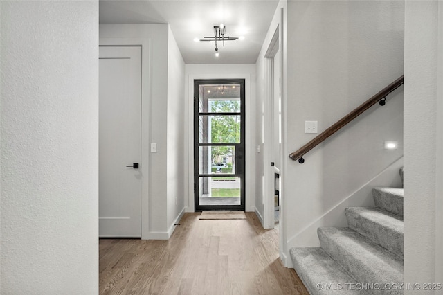 3008 S Boston Ct, Tulsa, OK 74114 - entrance foyer with light wood finished floors and stairway